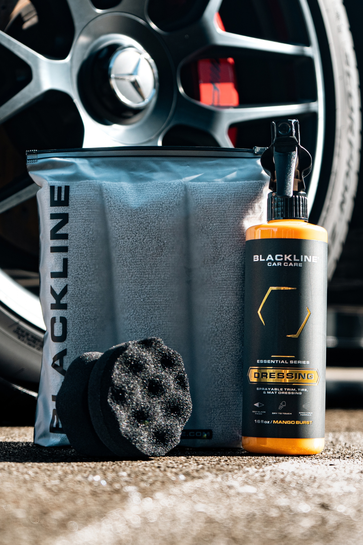 Blackline Dressing applied to tire sidewall with an applicator pad during detailing.