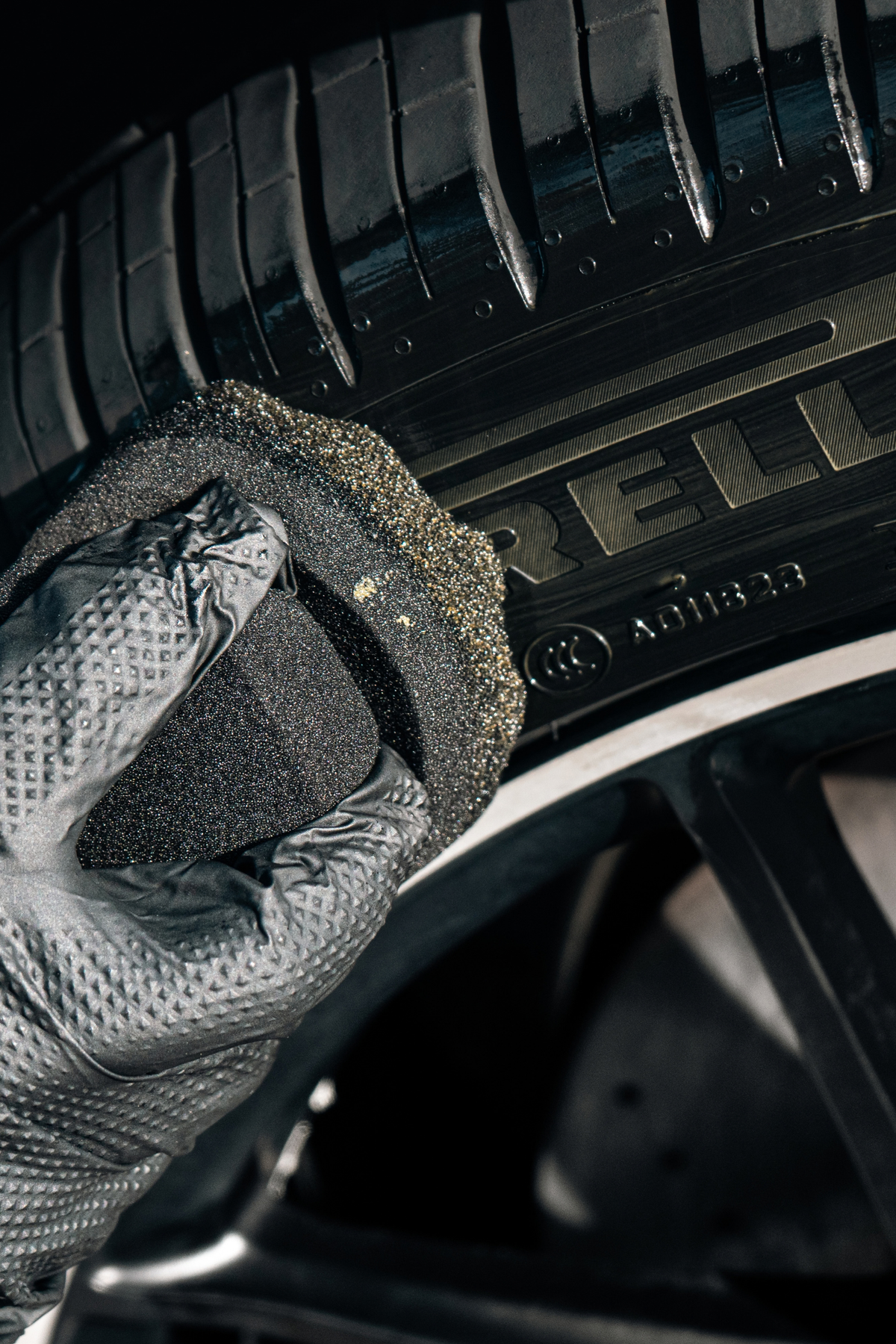 Tire sidewall showing deep black finish after Blackline Dressing treatment.