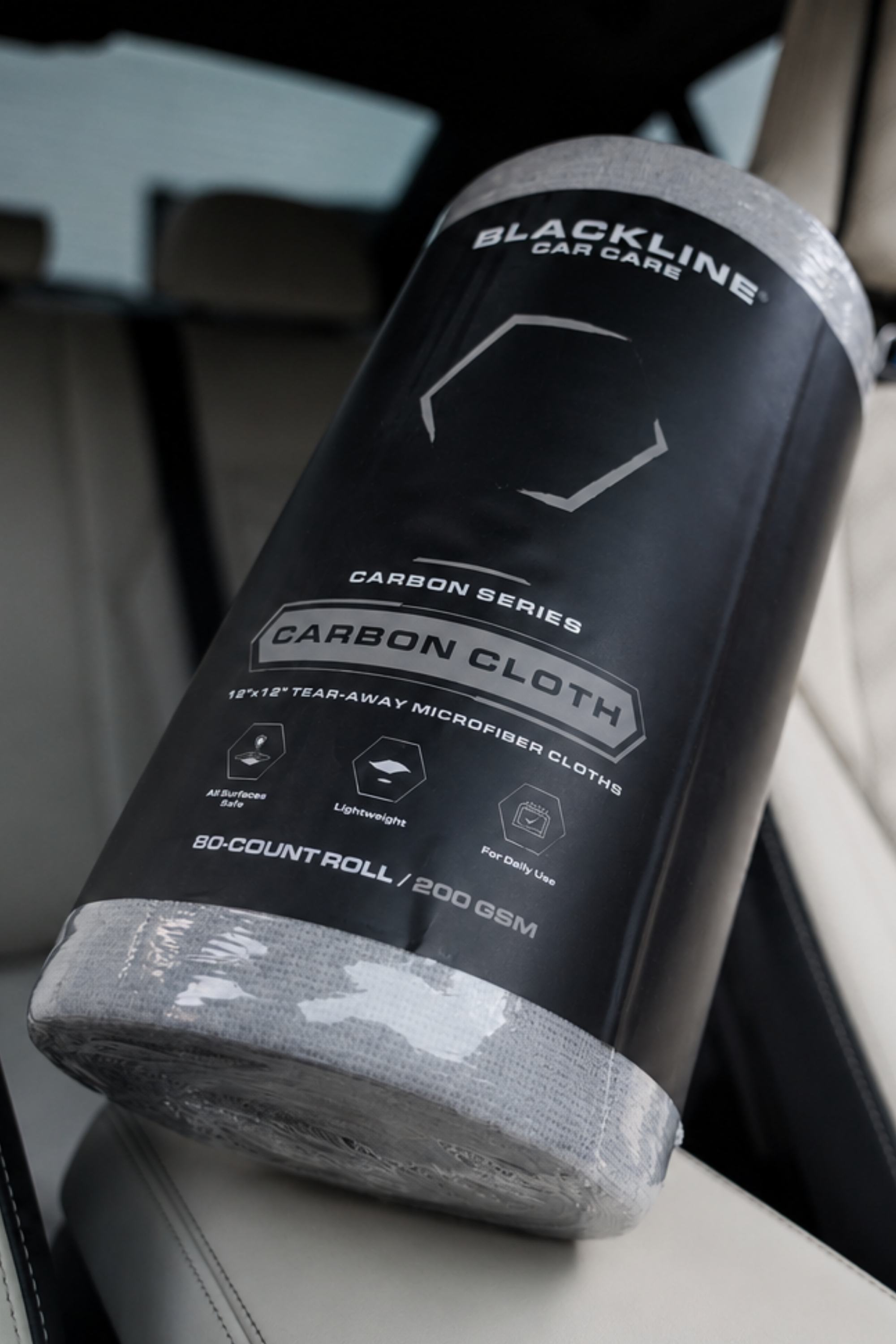 Blackline Carbon Cloth premium microfiber detailing cloth laid flat on a dark surface
