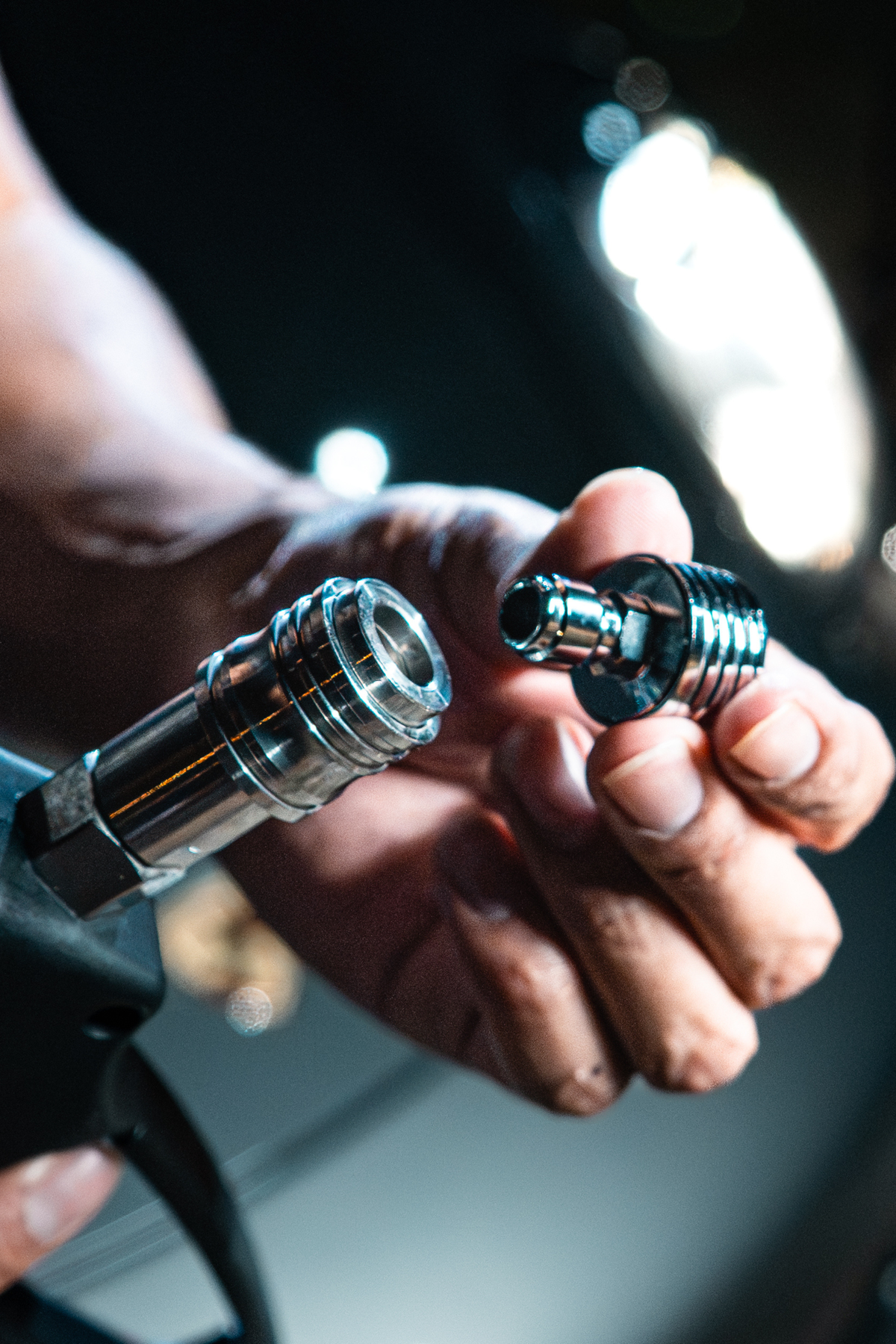 Blackline Flow Series 0.3mm rinse nozzle, angled view highlighting narrow aperture.