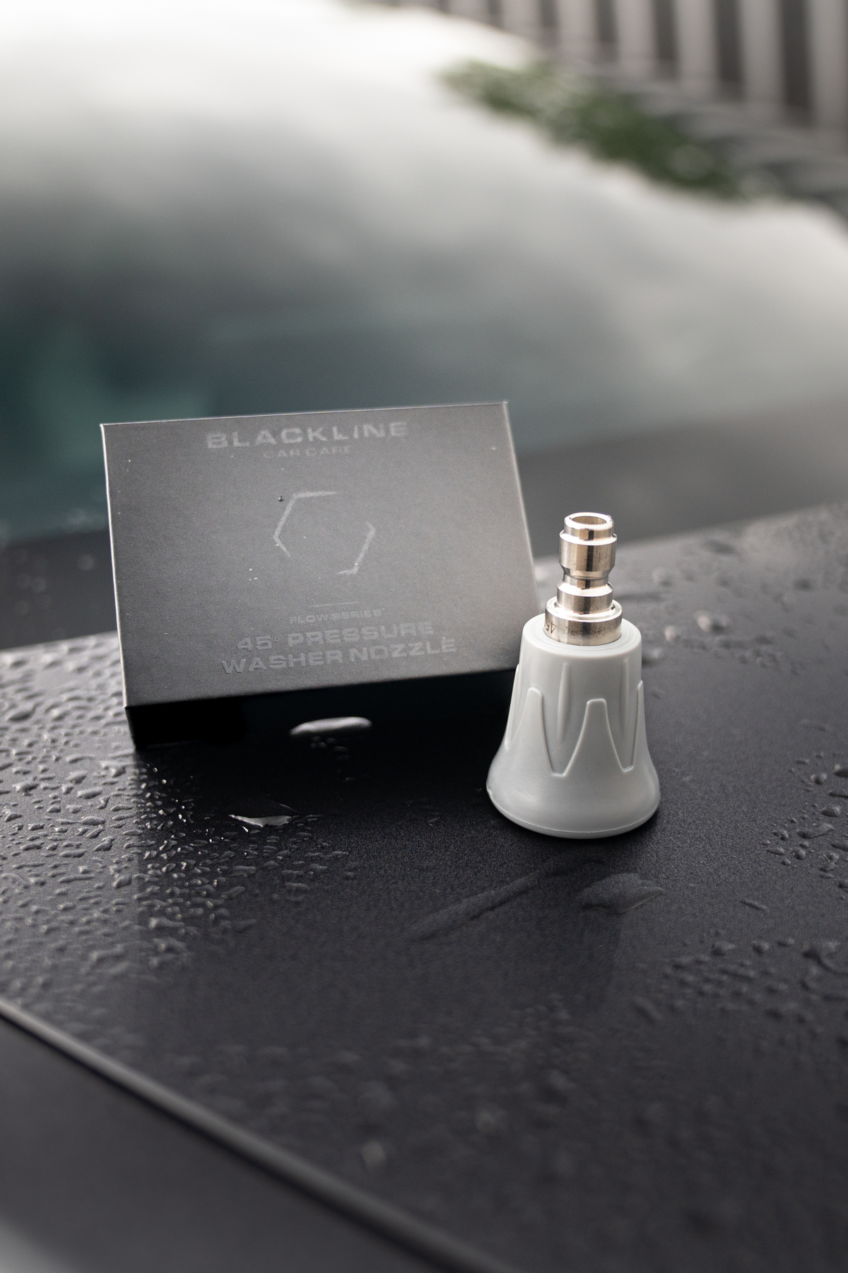 Blackline Flow Series 45-degree pressure washer nozzle, alternate angle view highlighting the precision black spray tip.