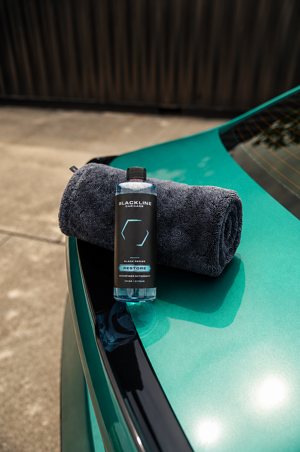 Blackline Restore Microfiber Detergent bottle on a clean studio background