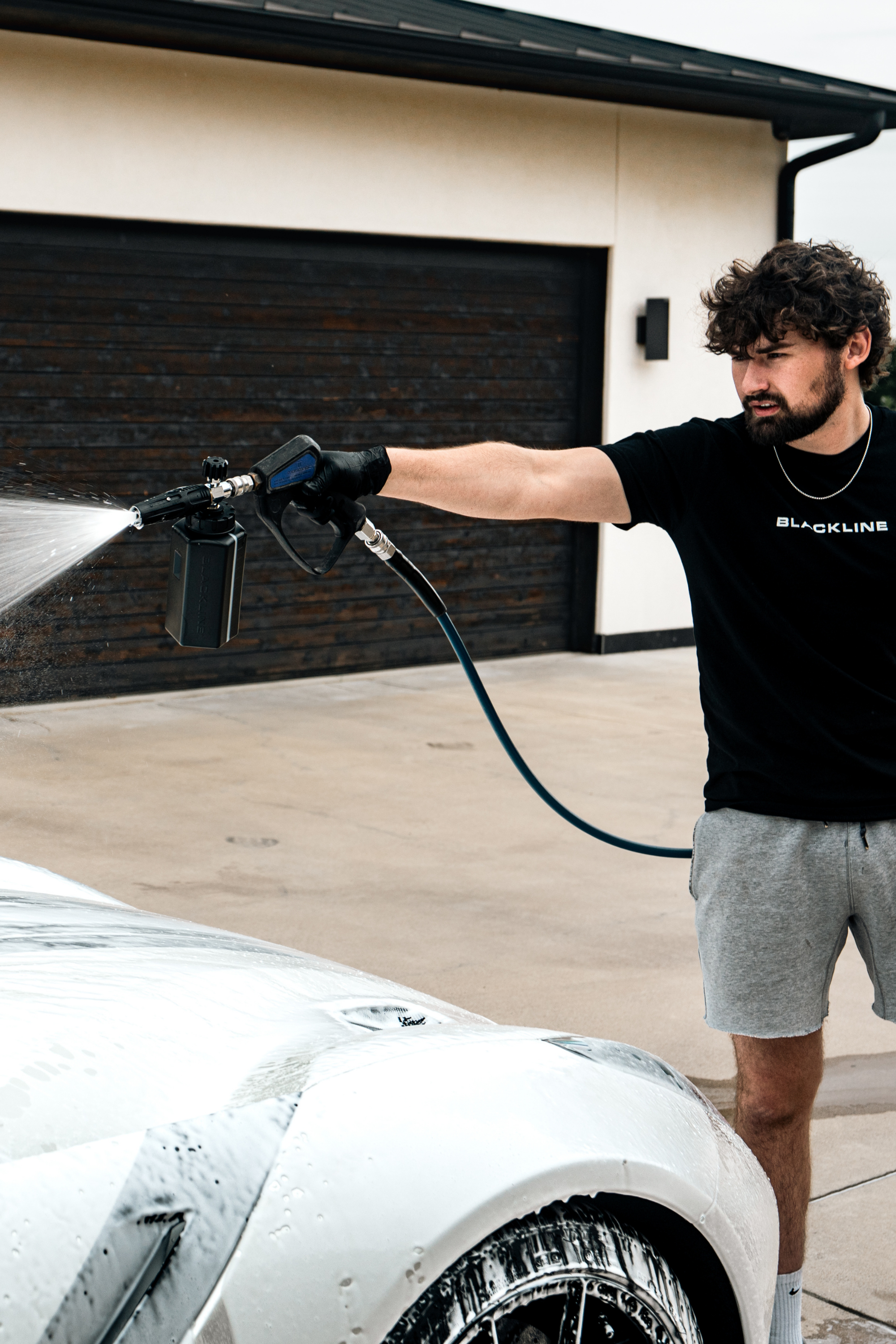 Blackline Flow Series pressure washer nozzle close-up highlighting the spray tip.