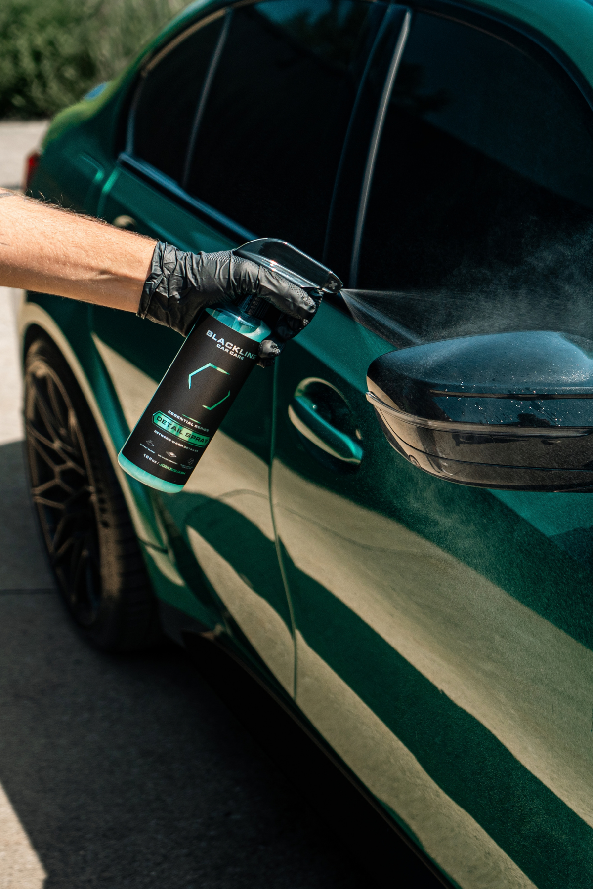 Blackline Detail Spray applied to car exterior panel producing mirror-like finish.