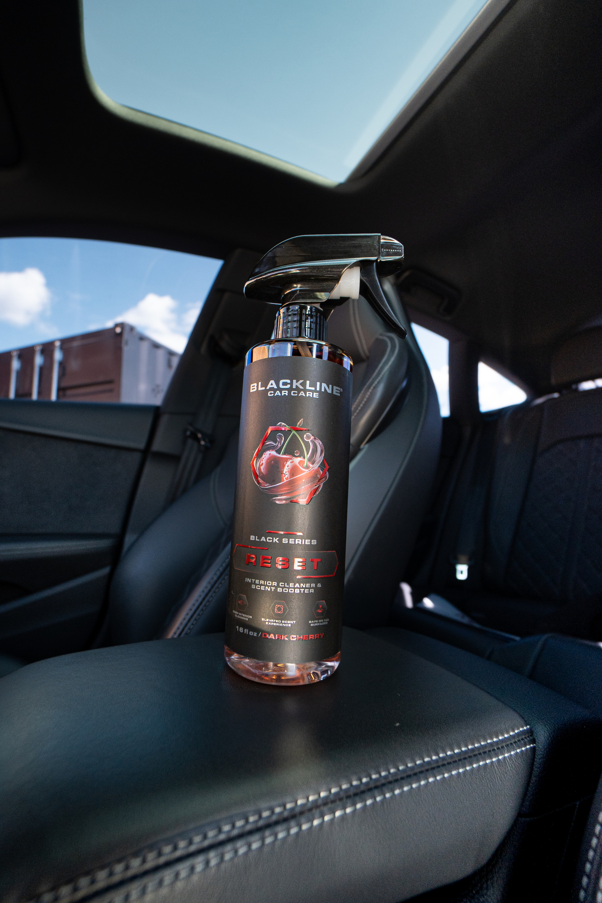 Blackline Reset interior cleaner spray bottle on dark background showing Black Series label