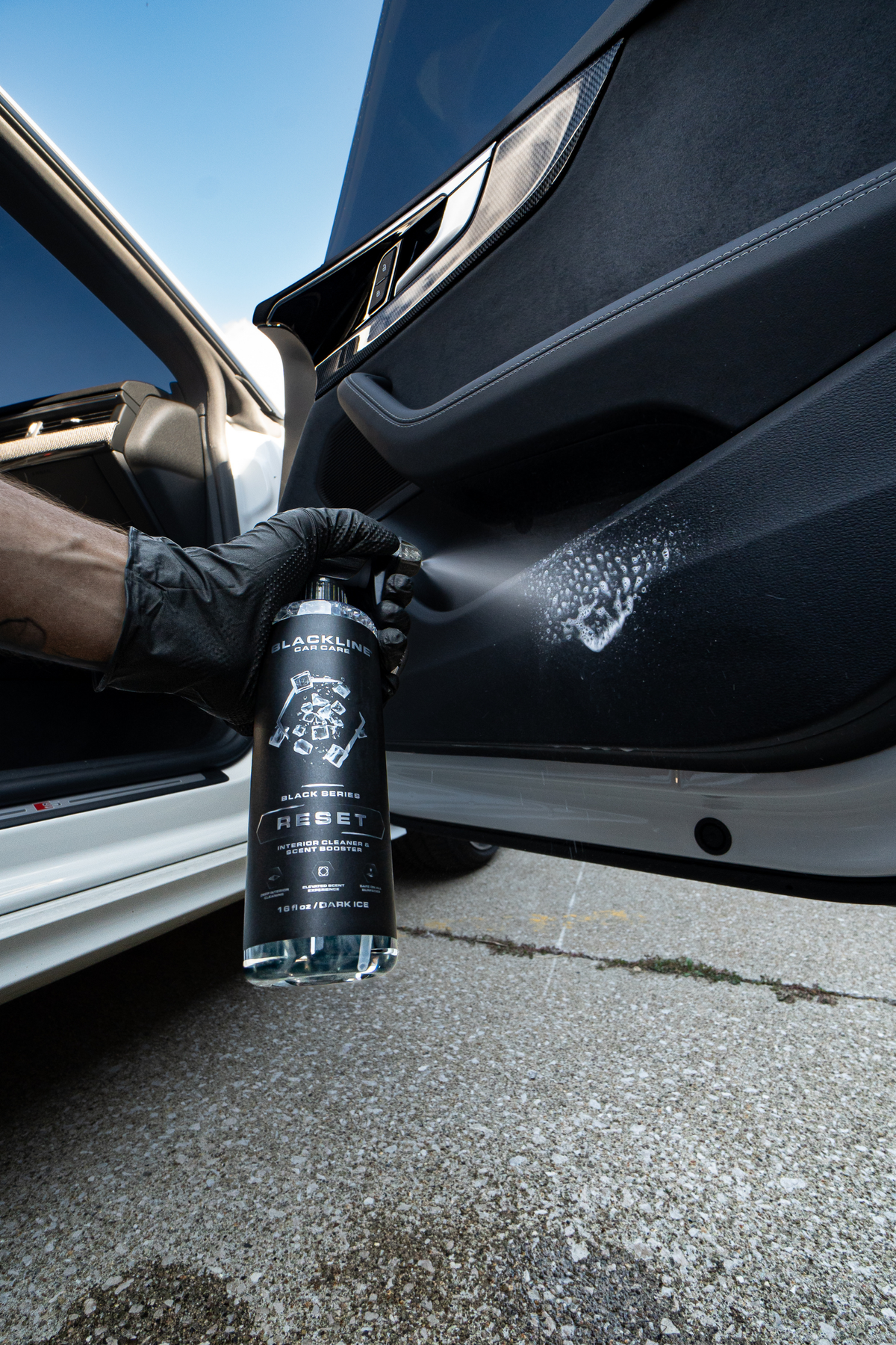 Blackline Reset scented interior cleaner lifestyle shot in a vehicle interior