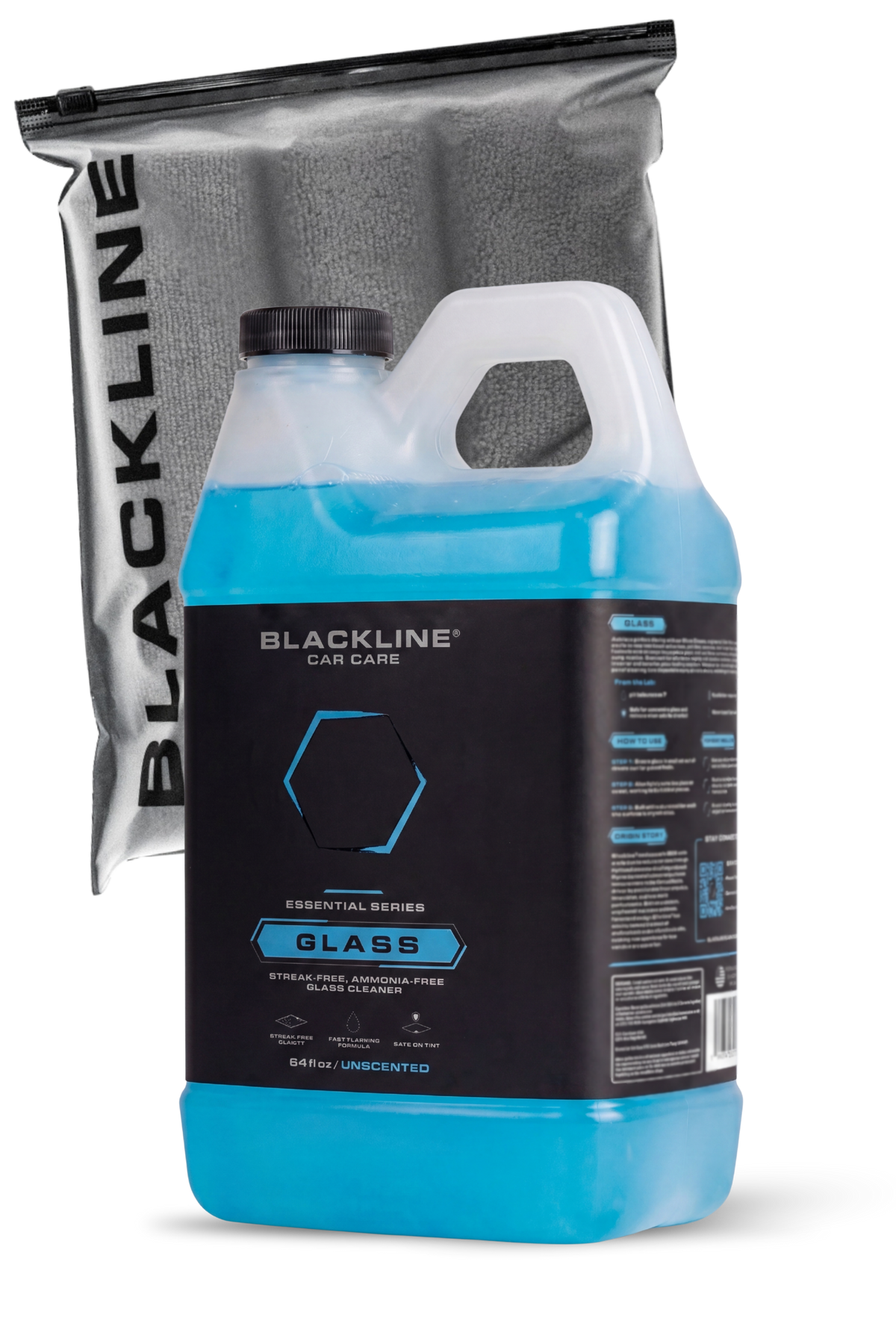 Blackline Glass automotive cleaner being applied to a vehicle window surface.