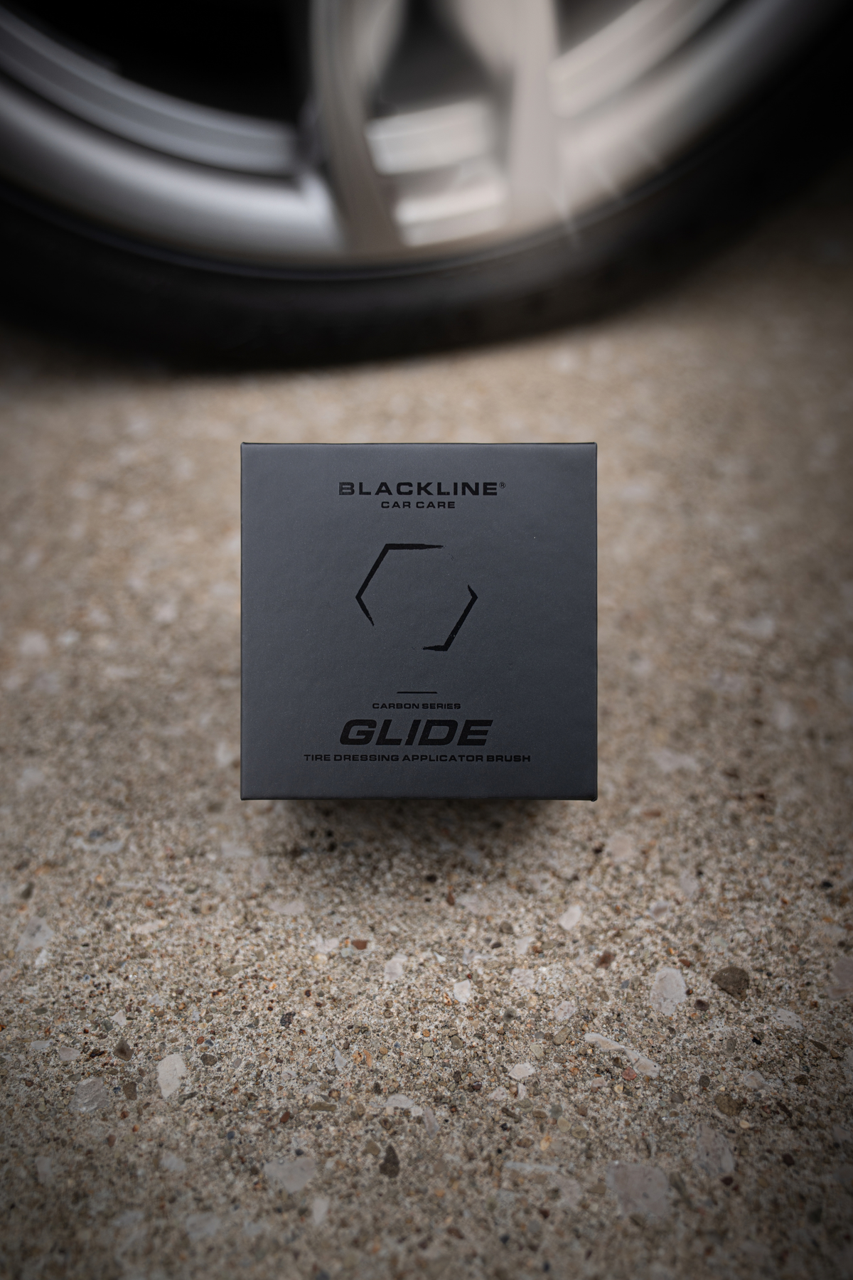Blackline Tire Shine Applicator Brush side profile showing complete product on dark background