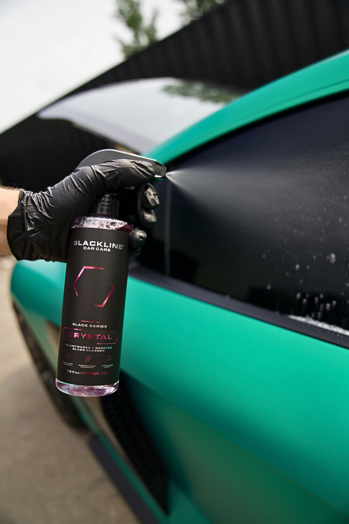Blackline Reset interior cleaner applied to car dashboard and trim panel