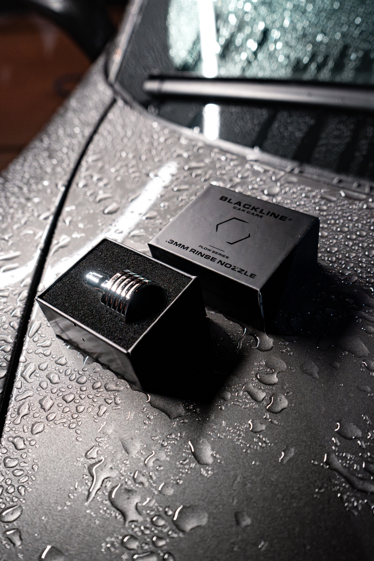 Blackline Flow Series 0.3mm rinse nozzle, side view showing precision tip.