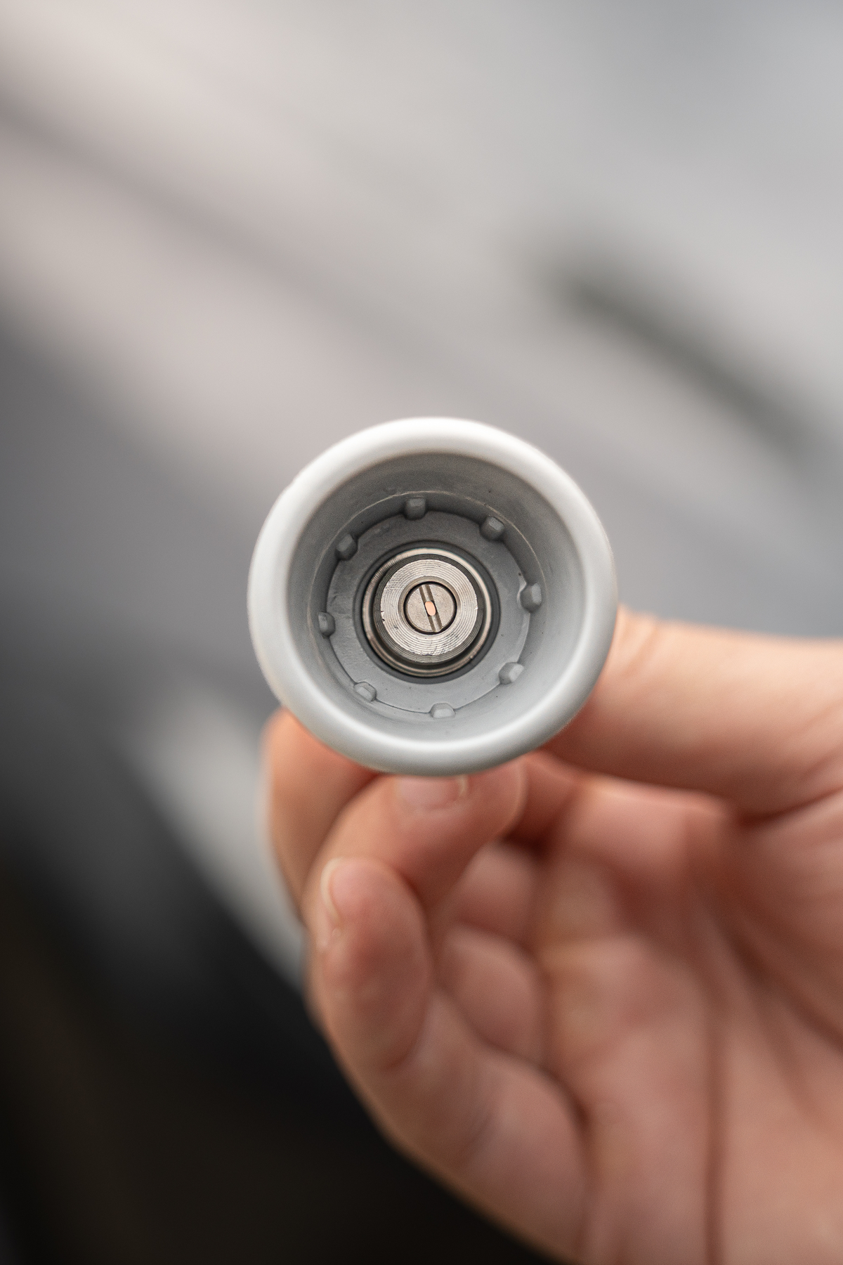 Blackline Flow Series 45-degree pressure washer nozzle at three-quarter angle.