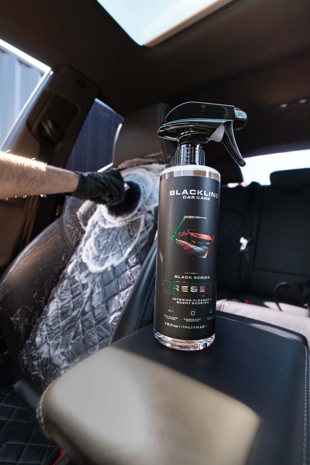 Blackline twisted-loop drying towel being used to wipe down a car exterior