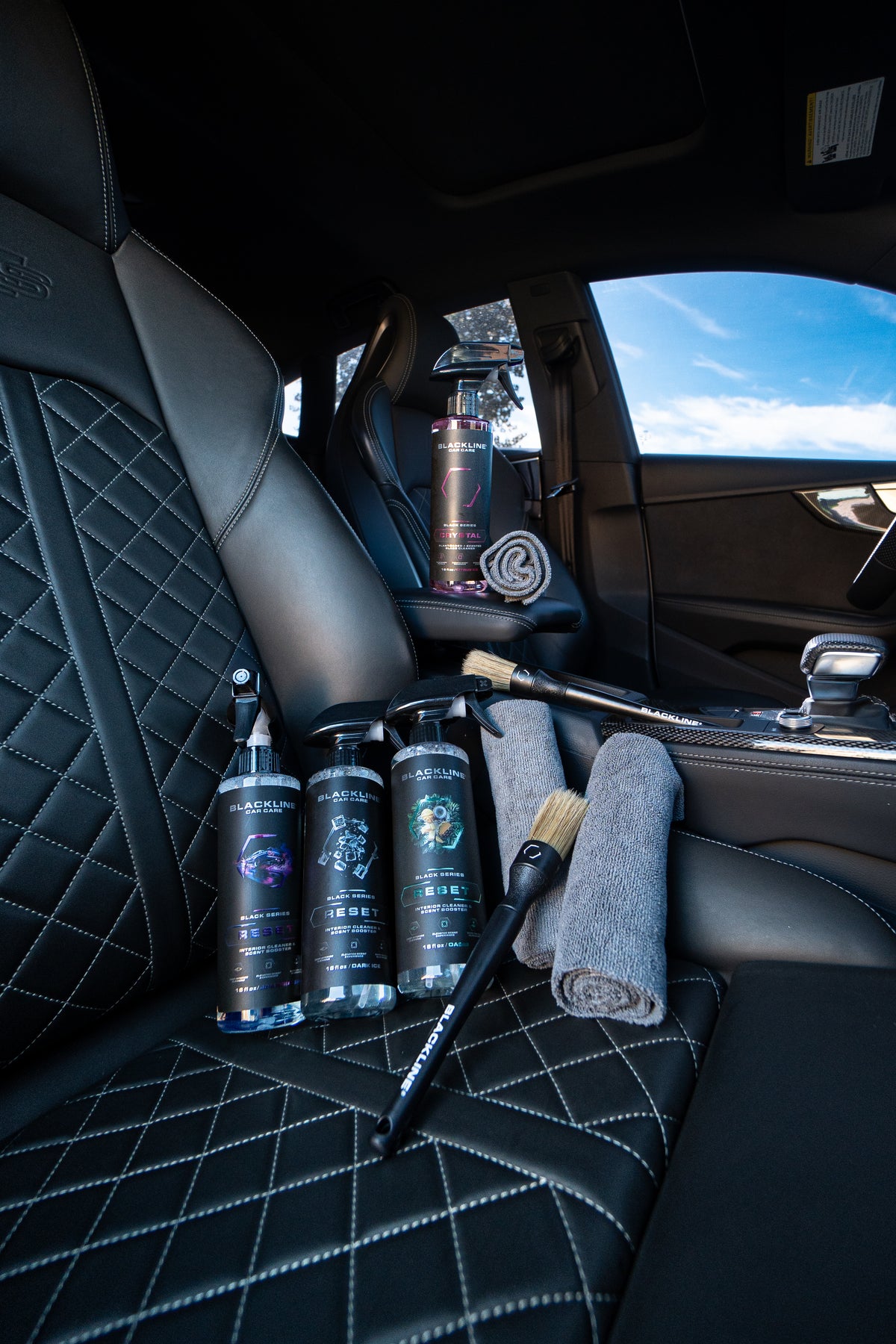 Blackline Reset Fresh scented interior cleaner spray bottle on dark background