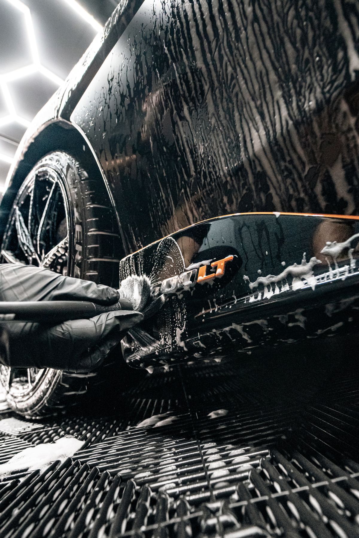 Blackline Ultra-Soft Detail Brush Set in use detailing dashboard vents