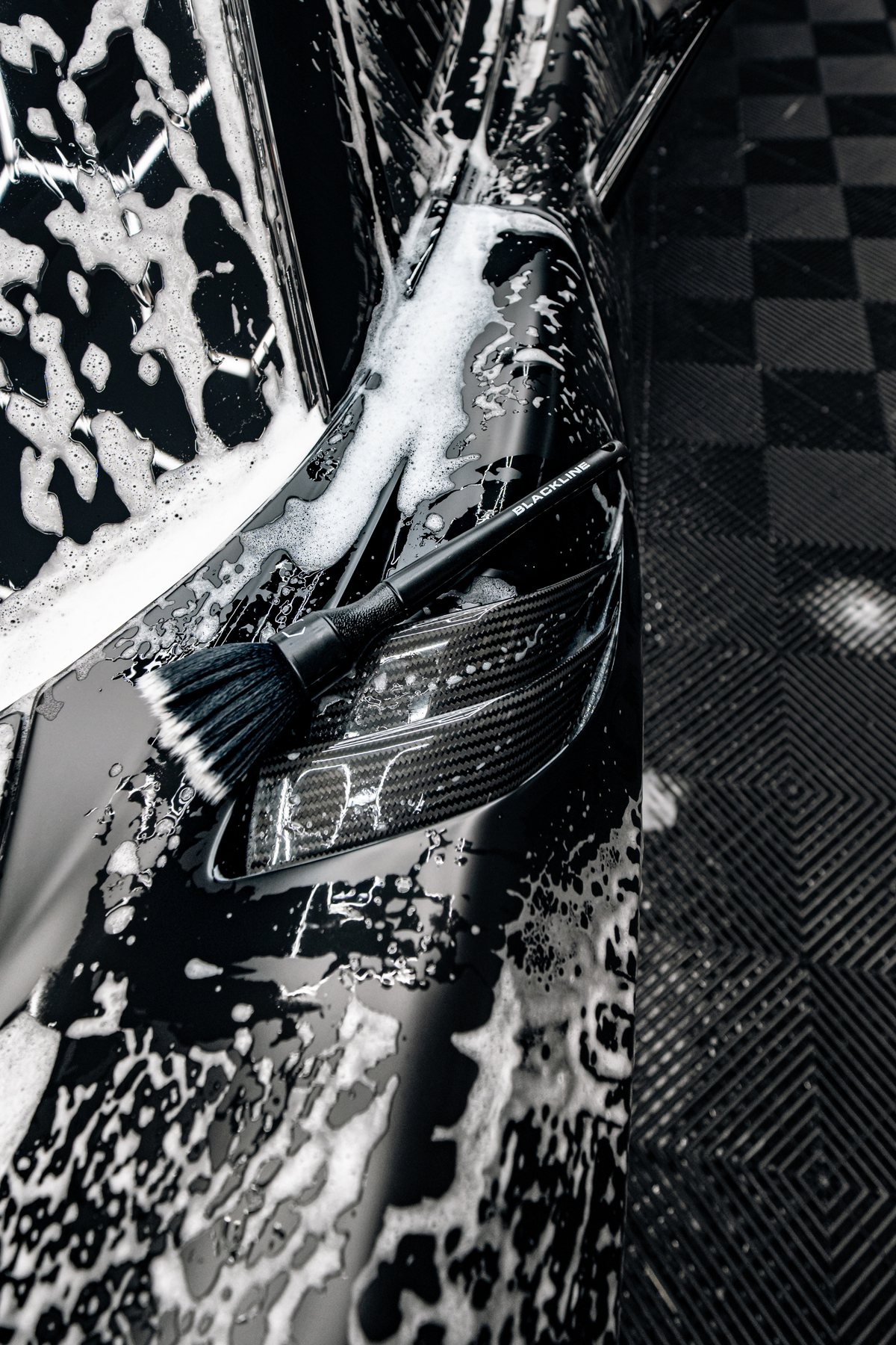Blackline Ultra-Soft Detail Brush Set cleaning car emblem showing precise bristle control