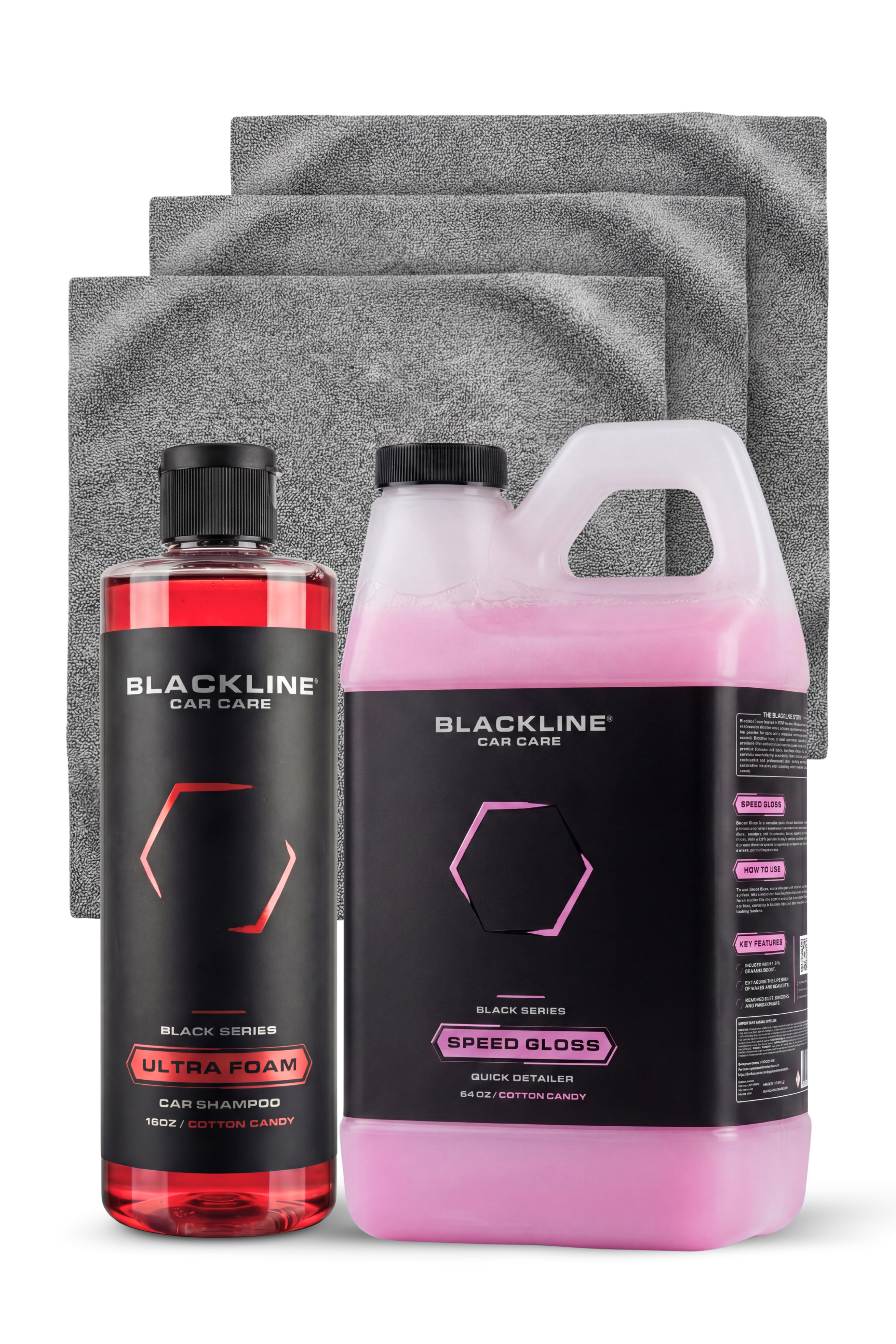 Blackline Car Care Ultra Foam shampoo and Speed Gloss detailer bundle on microfiber towels.